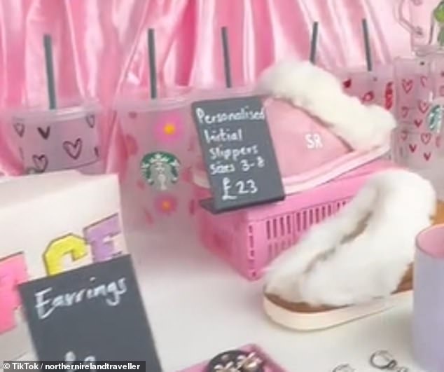 Pictured: the Belfast Christmas Market stall that is selling 'viral' presents, like the 'Just a Girl' hamster mug