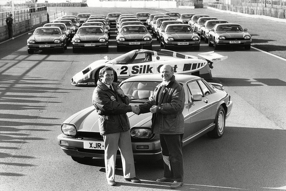 By the late eighties, TWR had become a major player on the competition scene, with Jaguar entrusting Walkinshaw to run its operations in both sports car championships. Tom Walkinshaw pictured with a competition winner who won an XJR