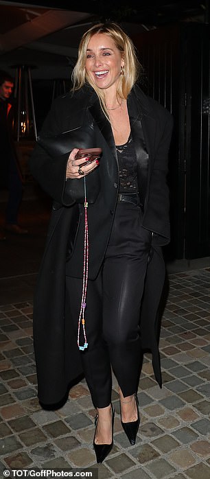 The former Eternal singer also wore a matching blazer and coat while she boosted her frame with black heels