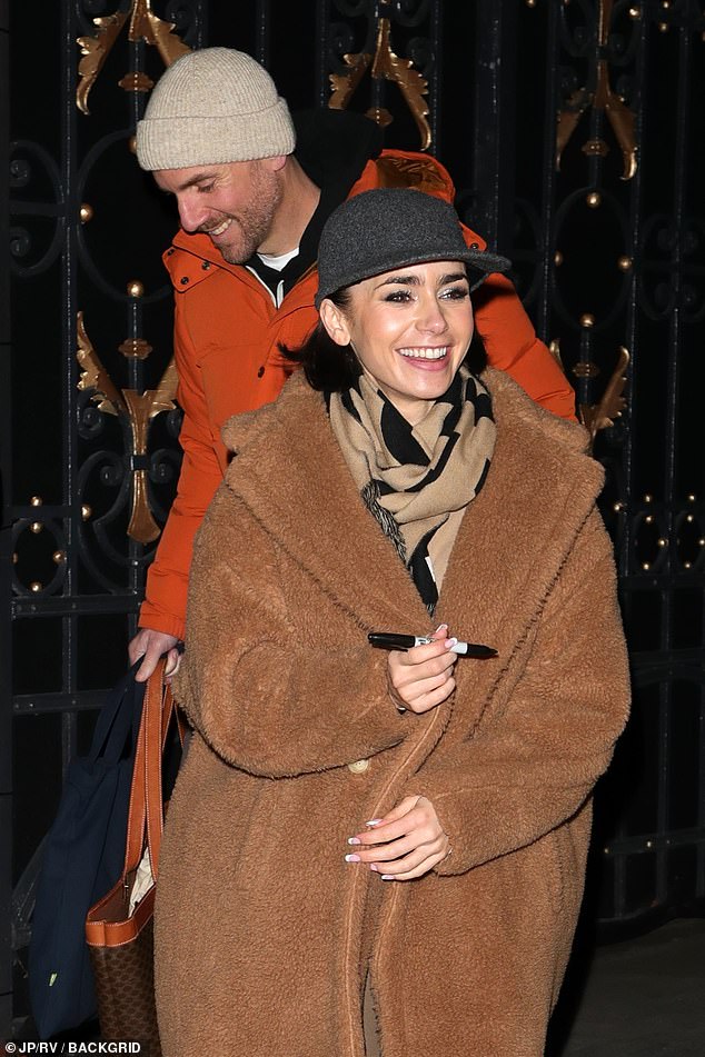 Lily Collins, 35 was supported by husband Charlie McDowell, 41, as she left London's Duke Of York's Theatre following her latest performance in West End play Barcelona on Thursday