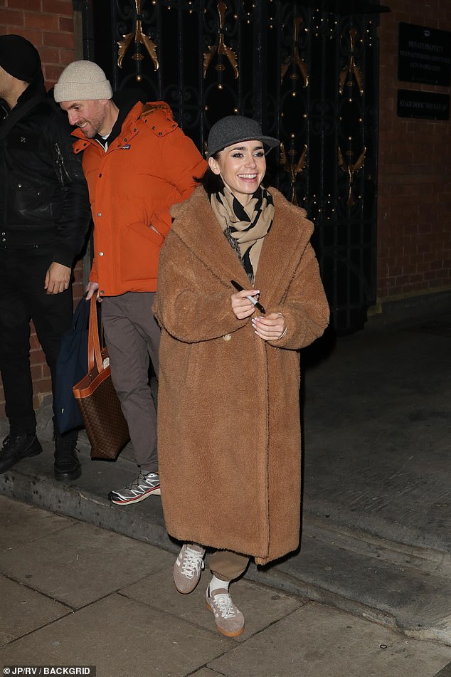 The Emily In Paris star, who made her West End debut in the show, stopped to sign autographs