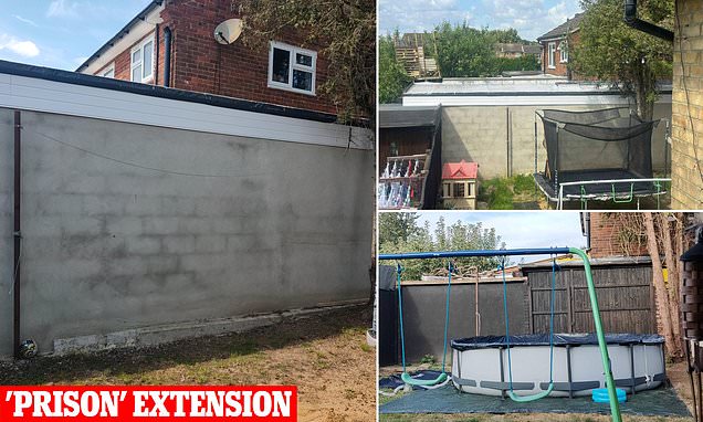 Family's fury after neighbour builds illegal 'concrete prison' extension that makes their