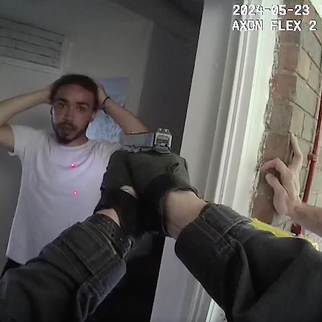 Bodycam footage then shows both men with their hands behind their head as tasers are pointed at them by officers at the entrance of their respective front doors