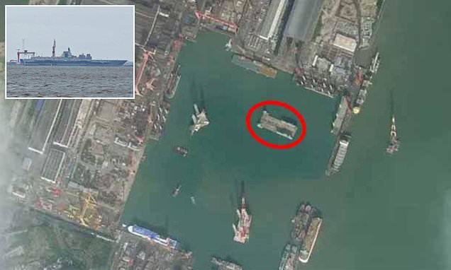 Alarming satellite image shows China's $9bn secret warship doing military tests in Pacific