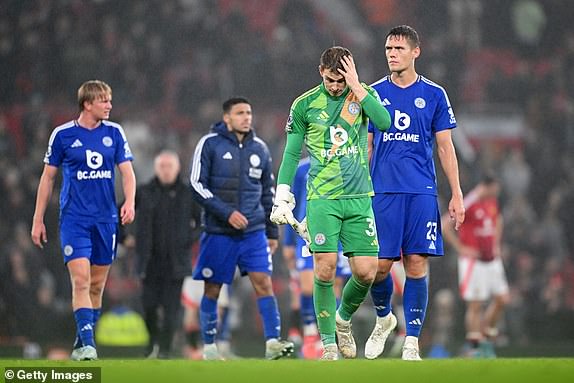 MANCHESTER, ENGLAND - NOVEMBER 10: Mads Hermansen of Leicester City looks dejected after the team's defeat in the Premier League match between Manchester United FC and Leicester City FC at Old Trafford on November 10, 2024 in Manchester, England. (Photo by Michael Regan/Getty Images)