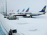 Storm Bert strikes: Passengers 'stranded on flight for hours' when airports close and travel chaos hits with blizzards bringing up to 16 inches of snow as Met Office map shows worst-hit areas