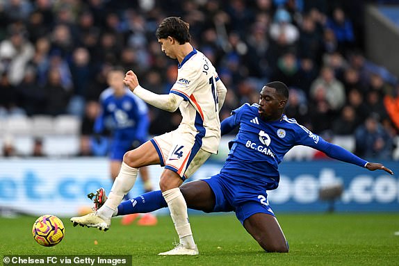 LEICESTER, ENGLAND - NOVEMBER 23: Boubakary Soumare of Leicester City tackles Joao Felix of Chelsea during the Premier League match between Leicester City FC and Chelsea FC at The King Power Stadium on November 23, 2024 in Leicester, England. (Photo by Darren Walsh/Chelsea FC via Getty Images)