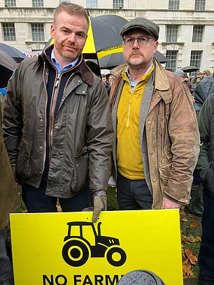 Defiant: Toby, right, and William Findlay on the march