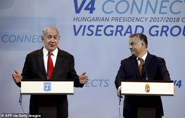 Israeli PM Benjamin Netanyahu (pictured left) could be arrested if he tries to enter Britain