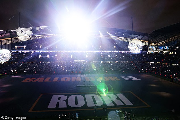 He showed it off during a form of light ceremony as fans greeted midfielder before kick off