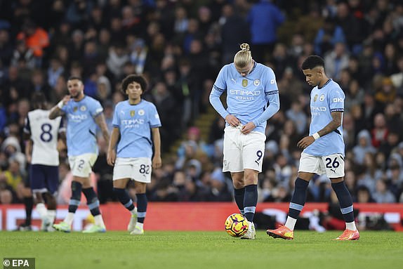 epa11736885 Manchester City players react to the 2-0 goal during the English Premier League soccer match between Manchester City and Tottenham Hotspur in Manchester, Britain, 23 November 2024.  EPA/ADAM VAUGHAN EDITORIAL USE ONLY. No use with unauthorized audio, video, data, fixture lists, club/league logos or 'live' services. Online in-match use limited to 120 images, no video emulation. No use in betting, games or single club/league/player publications.