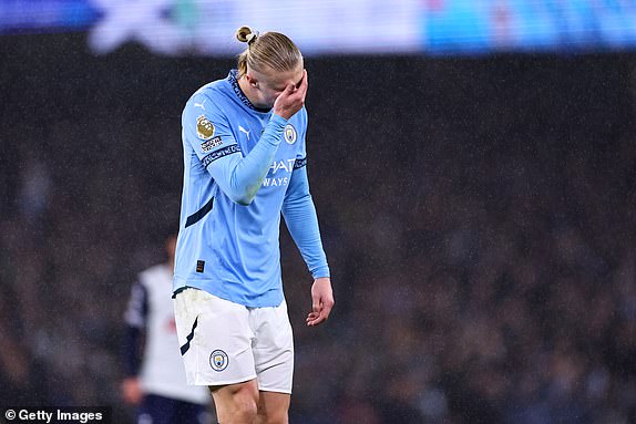 MANCHESTER, ENGLAND - NOVEMBER 23: Erling Haaland of Manchester City reacts during the Premier League match between Manchester City FC and Tottenham Hotspur FC at Etihad Stadium on November 23, 2024 in Manchester, England. (Photo by Robbie Jay Barratt - AMA/Getty Images)