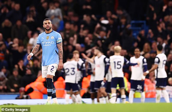 MANCHESTER, ENGLAND - NOVEMBER 23: Kyle Walker of Manchester City looks dejected after Brennan Johnson of Tottenham Hotspur (not pictured) scores his team's fourth goal during the Premier League match between Manchester City FC and Tottenham Hotspur FC at Etihad Stadium on November 23, 2024 in Manchester, England. (Photo by Naomi Baker/Getty Images)