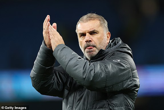 MANCHESTER, ENGLAND - NOVEMBER 23: Ange Postecoglou, Manager of Tottenham Hotspur, applauds the fans following the Premier League match between Manchester City FC and Tottenham Hotspur FC at Etihad Stadium on November 23, 2024 in Manchester, England. (Photo by Carl Recine/Getty Images)