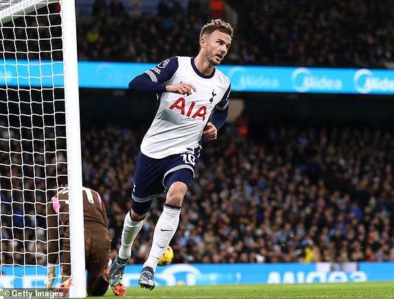 MANCHESTER, ENGLAND - NOVEMBER 23: James Maddison of Tottenham Hotspur celebrates scoring his team's first goal during the Premier League match between Manchester City FC and Tottenham Hotspur FC at Etihad Stadium on November 23, 2024 in Manchester, England. (Photo by Naomi Baker/Getty Images)