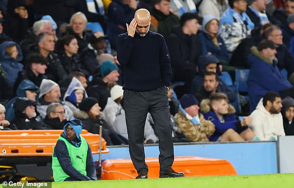 MANCHESTER, ENGLAND - NOVEMBER 23: Pep Guardiola, Manager of Manchester City, looks dejected during the Premier League match between Manchester City FC and Tottenham Hotspur FC at Etihad Stadium on November 23, 2024 in Manchester, England. (Photo by Carl Recine/Getty Images)