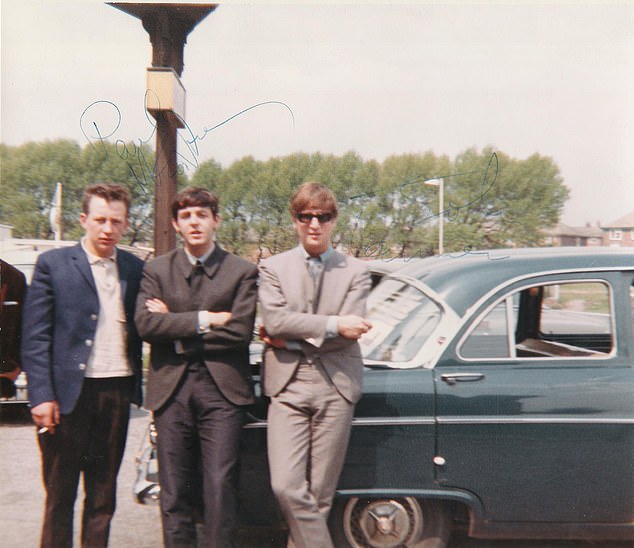 In the presence of greatness: This photo features our reader Simon's dad with Paul and John