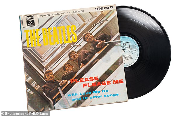 Iconic: The front cover of the Please Please Me features the Fab Four in a stairwell