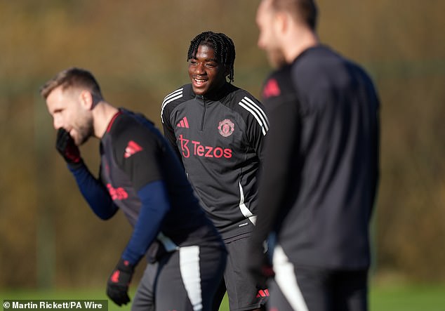 Luke Shaw (left) remains on the sidelines but could also be seen in training on Wednesday