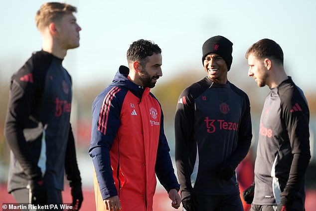 Players, including Rasmus Hojlund (left) and Marcus Rashford (2nd right) looked in good spirits