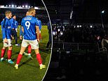 Portsmouth's clash with Millwall is postponed due to a POWER CUT at Fratton Park after fans are left in darkness for almost an hour... as Southampton taunt their bitter rivals with mocking post