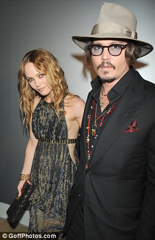 My saviour: Johnny Depp with his wife  Vanessa Paradis, the woman who saved him from drunken self-destruction