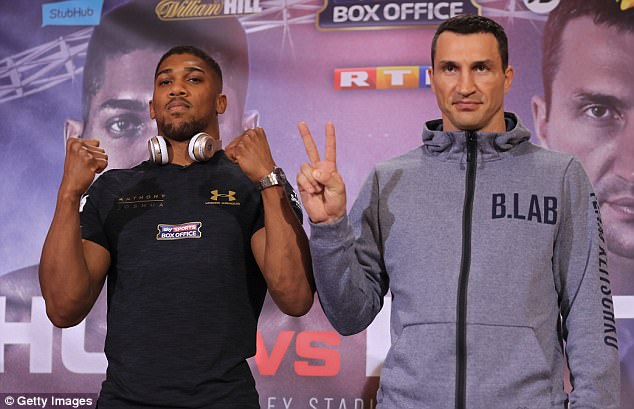 Anthony Joshua and Wladimir Klitschko pose for a picture after their press-conference