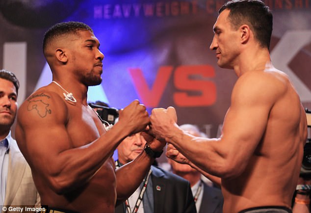 British star Joshua and Klitschko face off during Friday's weigh-on at Wembley Arena 