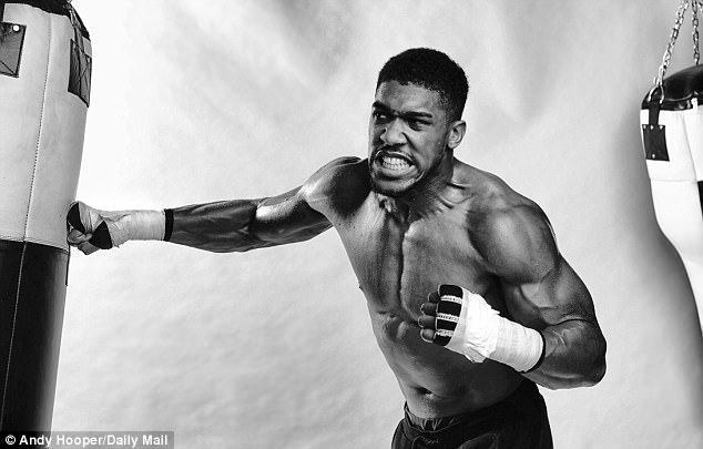 Joshua works on the punch bag ahead of his big-fight showdown against Klitschko