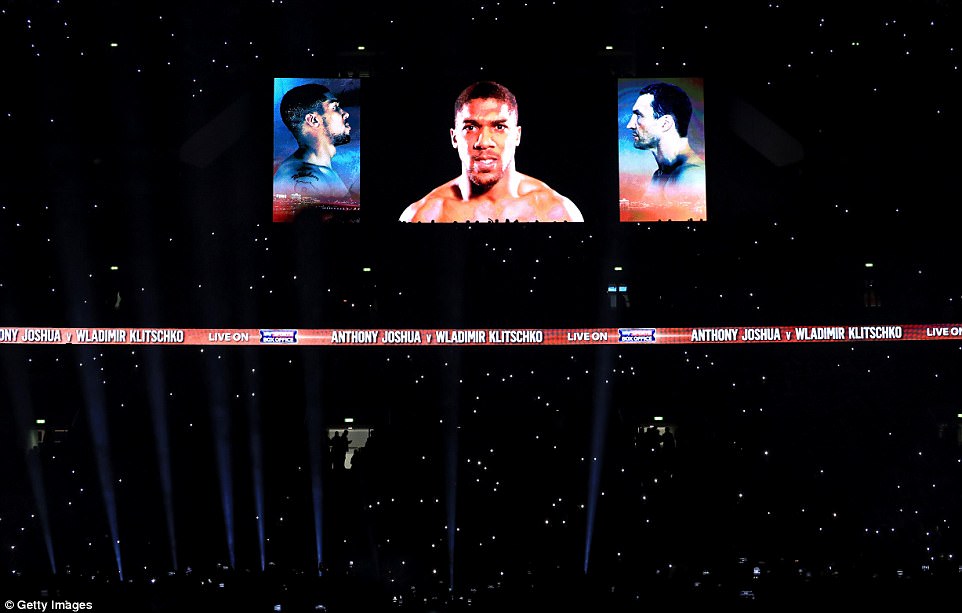 Joshua's face was televised to the thousands of fans inside the arena shortly before he made his entrance