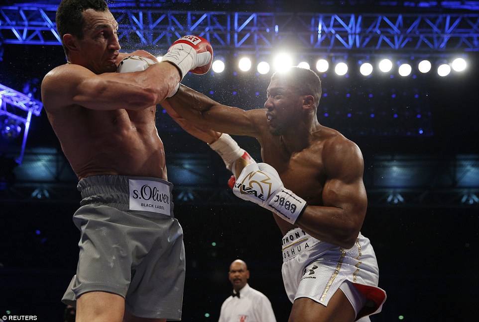 Joshua connects with a superb overhand right as Klitschko struggles to deal with the British fighter's power