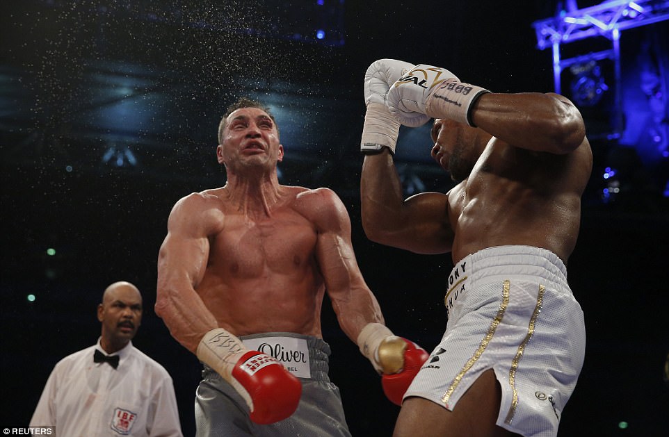 The iconic photograph of the night captures Anthony Joshua's stunning uppercut on his Ukrainian foe Wladimir Klitschko 