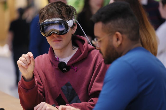 People experience a demo of the Apple Vision Pro headset at the Fifth Avenue Apple store on February 02, 2024 in New York City