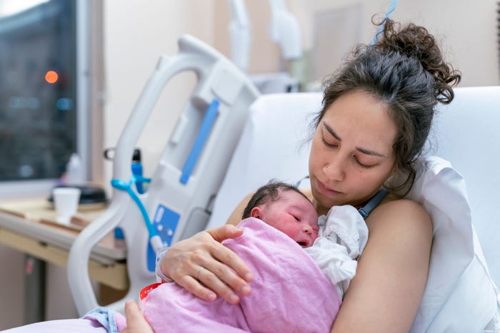 mom with newborn