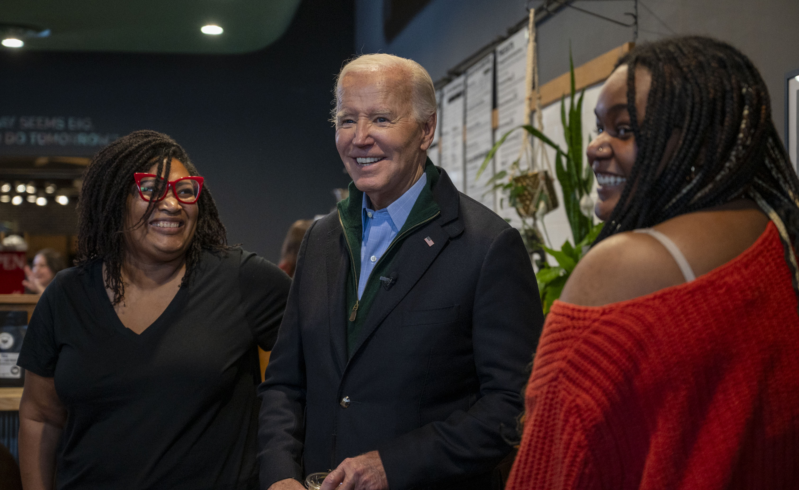 President Joe Biden visits Friday, Jan. 12, 2024, with patrons and staff at Nowhere Coffee Co. in Emmaus. The president visited the Lehigh Valley to meet with small business owners and highlight his economic agenda. (April Gamiz / The Morning Call)