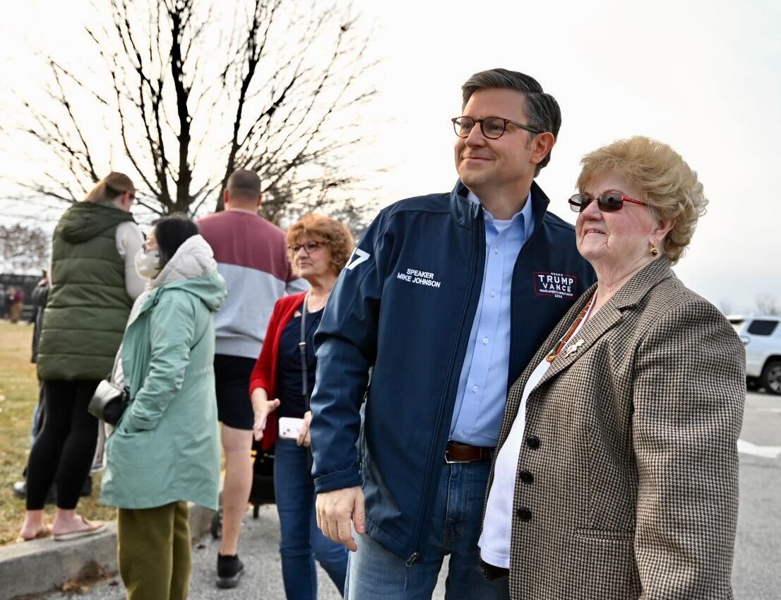 Republican voter Labina Zito of Bethlehem Township poses for a picture with Speaker of the House Mike Johnson on Tuesday, Nov. 5, 2024, at Farmersville Elementary School in Bethlehem Township. (April Gamiz / The Morning Call)