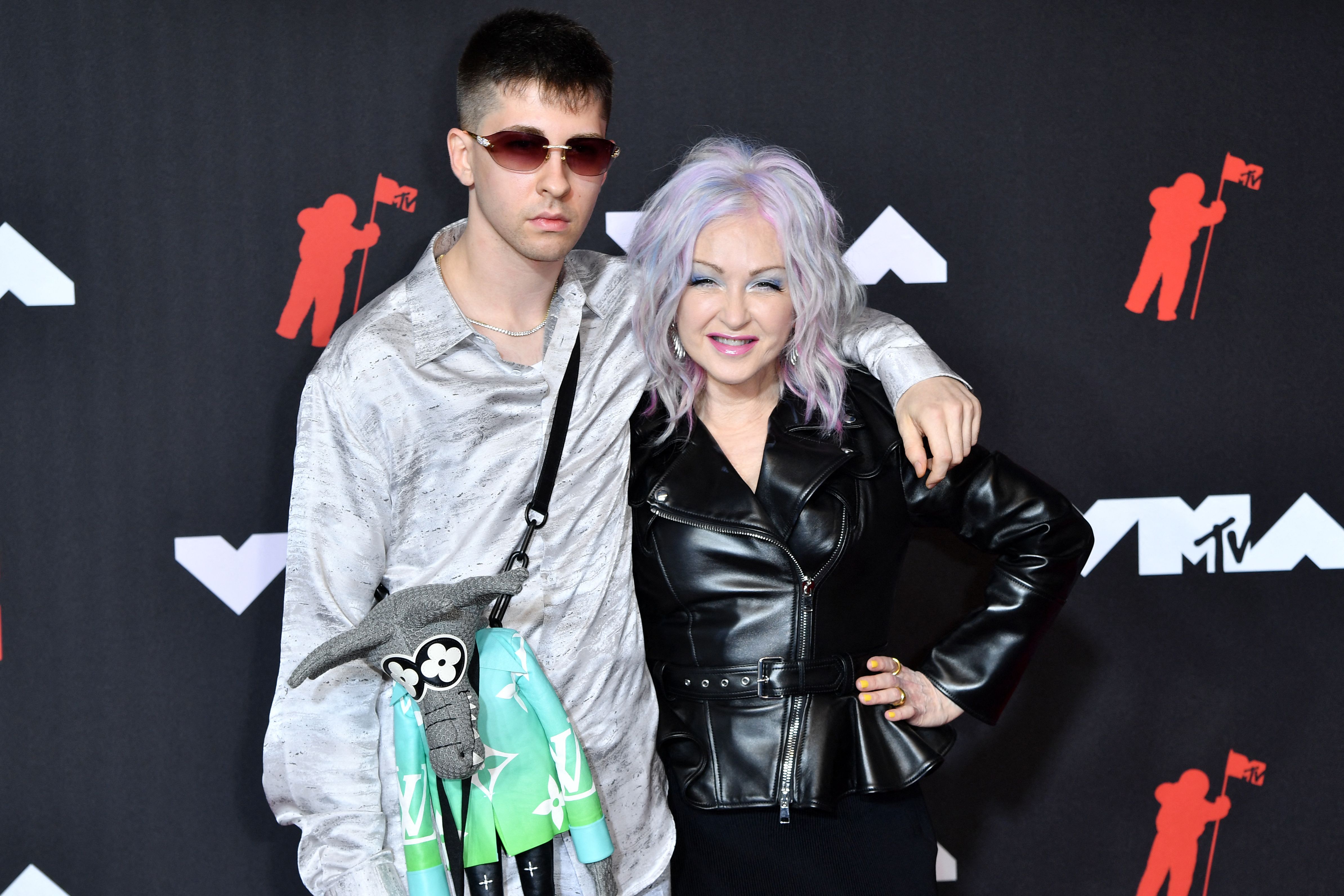 US singer Cyndi Lauper (R) and her son Declyn arrive for the 2021 MTV Video Music Awards at Barclays Center in Brooklyn, New York, September 12, 2021. (Photo by ANGELA WEISS / AFP) (Photo by ANGELA WEISS/AFP via Getty Images)