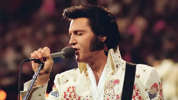 Elvis Presley performs in his iconic American Eagle jumpsuit in 1973