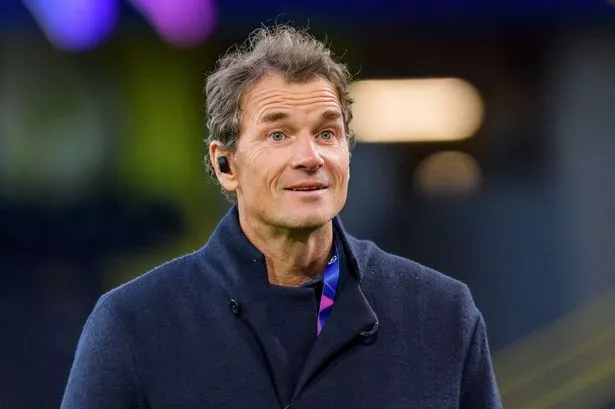 Jens Lehmann looks on 