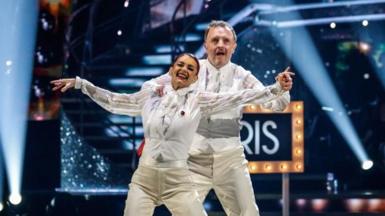 Chris McCausland and Dianne Buswell dancing during a live show of Strictly Come Dancing