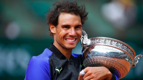 Rafael Nadal with French Open trophy