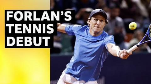 Diego Forlan hits a forehand