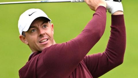 Golfer Rory McIlroy mid-swing