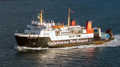 Hebridean Isles, a black and white ship with red funnels sailing with a wake of white water behind it