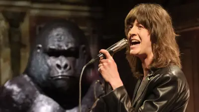 Blossoms singer Tom Ogden singing on Later... With Jools Holland, with a giant Gary gorilla watching on