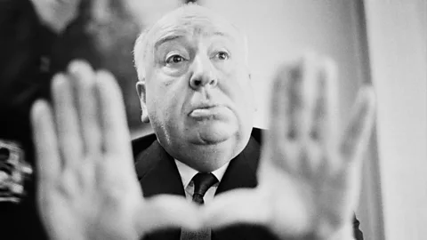 A black and white still of Alfred Hitchcock (Credit: Getty Images)