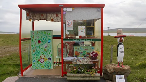 Karen Gardiner Bobby’s Bus Shelter takes on a new theme each year and has become an unlikely tourist attraction (Credit: Karen Gardiner)