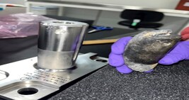 This undated photo provided by NASA shows a recovered chunk of space junk from equipment discarded at the International Space Station. The cylindrical object that tore through a home in Naples, Fla., March 8, 2024, was subsequently taken to the Kennedy Space Center in Cape Canaveral, Fla., for analysis. (NASA via AP)