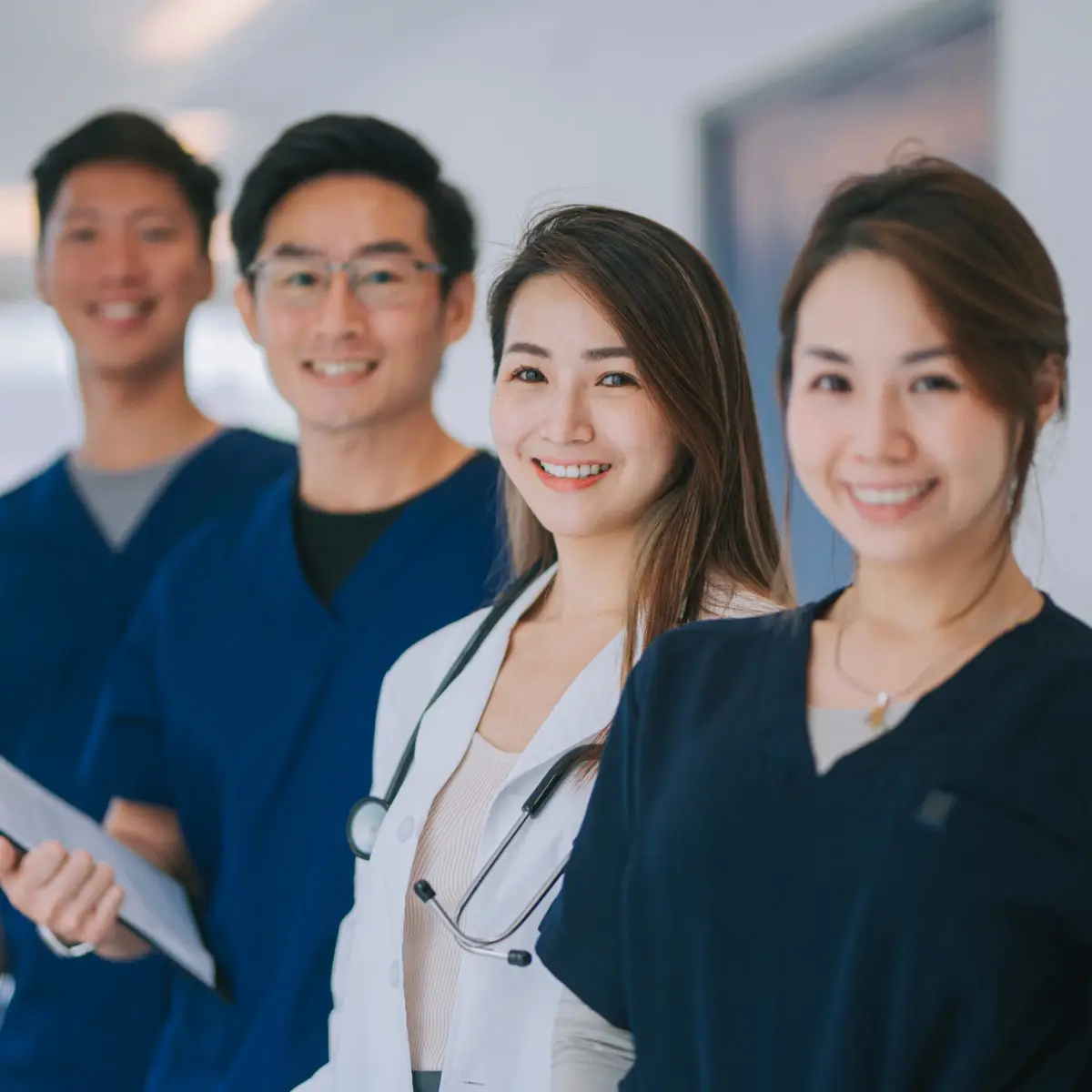 A group of doctors and nurses who use Docusign to improve healthcare efficiency.