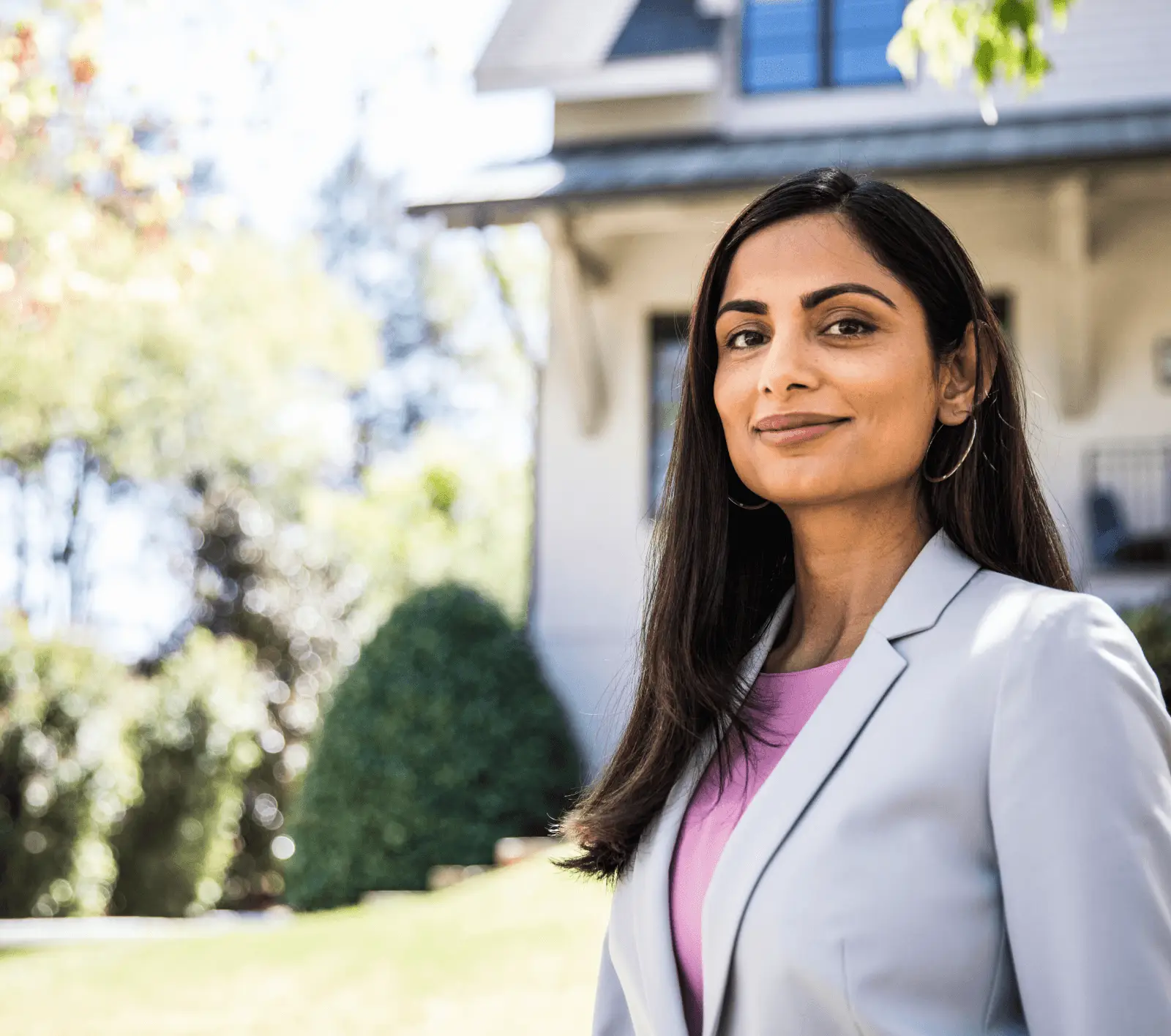 An insurance carrier in front of a home